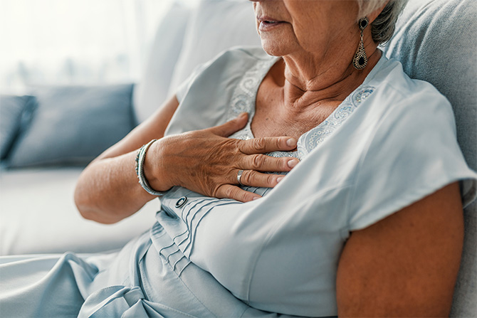 heart disease woman sitting