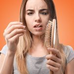 stop female hair loss girl brush